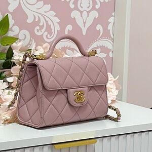 Brand new Chanel mini flap bag with  handle